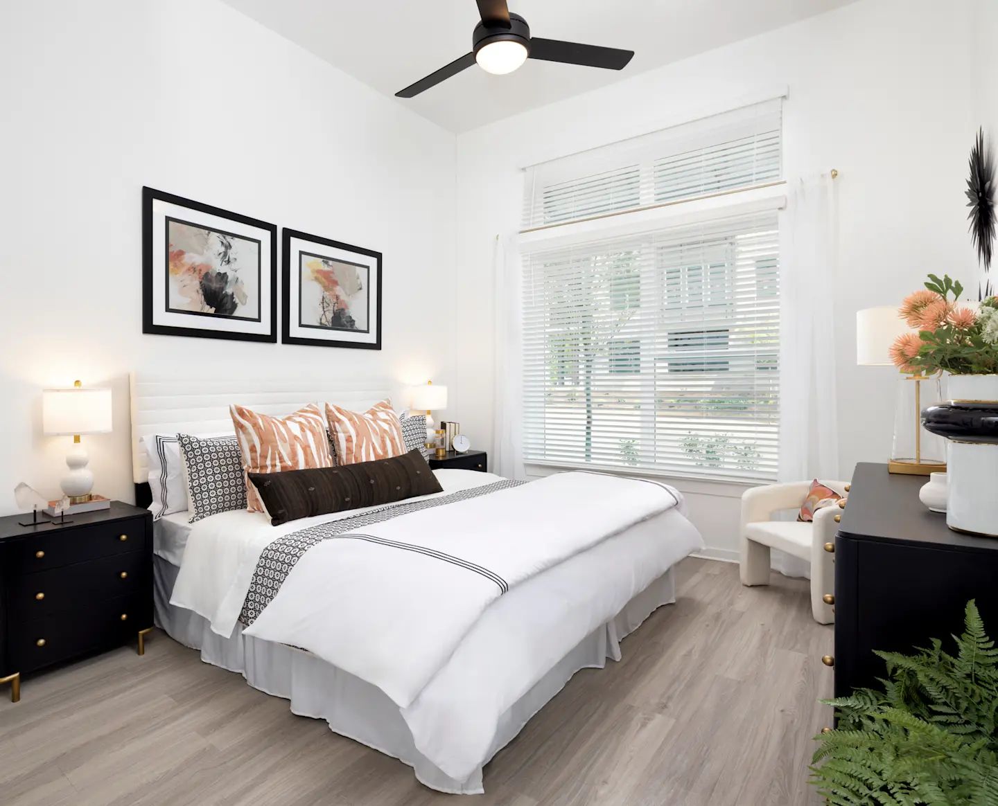 Spacious bedrooms with lighted ceiling fans